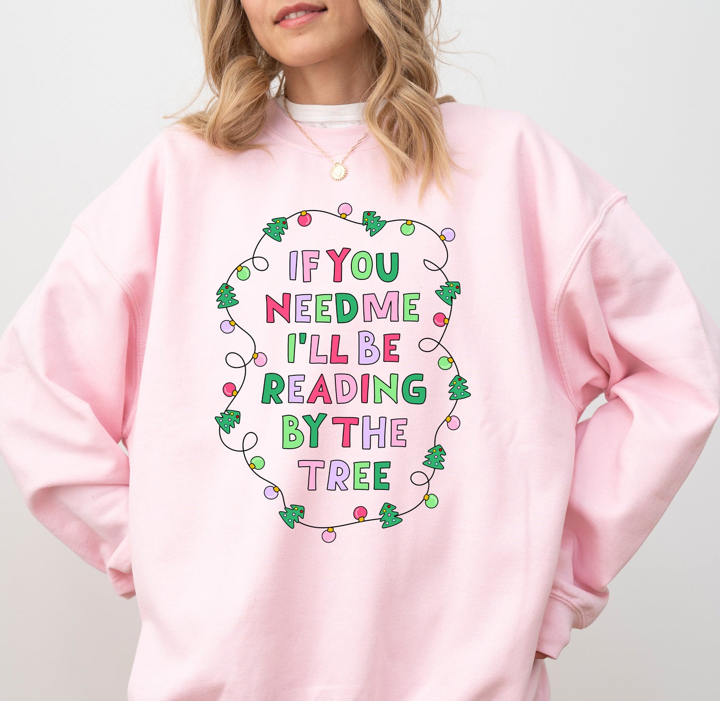 Reading by the Tree Christmas Sweater